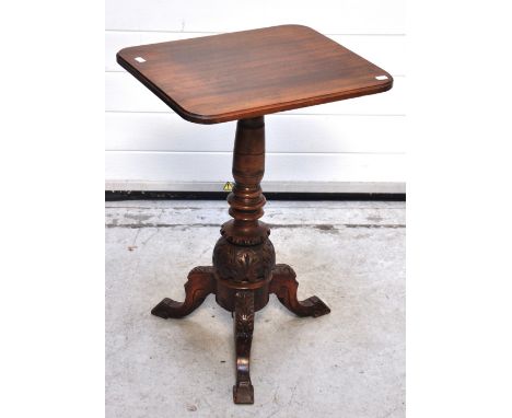 A Victorian pedestal table on a carved tripod base decorated with acanthus leaves,  height 74cm.