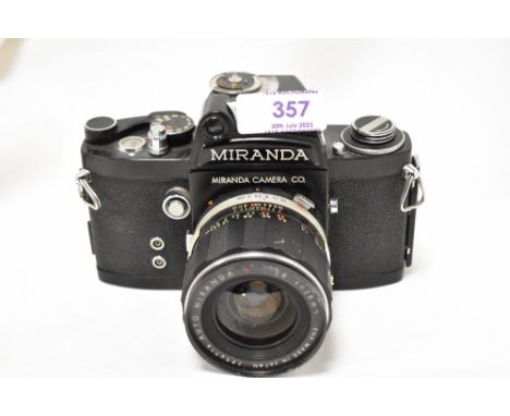 A Miranda F camera (in Black) No705155 with Miranda Auto E 1:2,8 28mm lens. CONDITION REPORT Some light scratches by viewfind