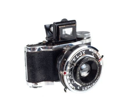 A vintage ELJY Lumiere sub-miniature film camera. In a Delsey case, H5cm
