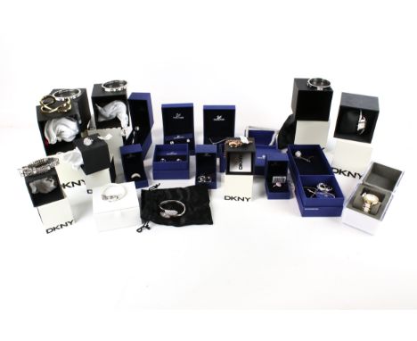 A collection of modern DKNY and Swarovski costume jewellery, all in boxes Comprising; Swarovski; six rings, twoo pias of earr