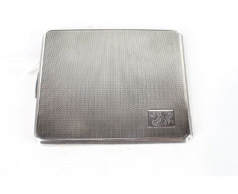 A silver rectangular engine-turned cigarette case. With a rectangular reserve engraved with script initials, mark of Smith an