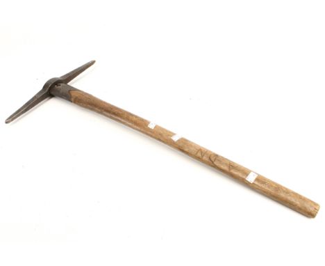 A vintage miners 'Peck' pickaxe. Made by Hardy Pentent Pick Co. Ltd, L82cm