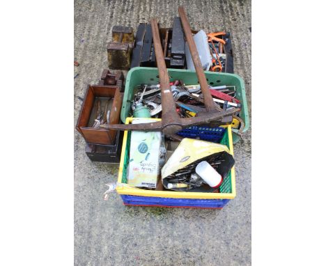 A large quantity of vintage hand tools. Including weights (56lb), a pick axe and a large sledge hammer, etc