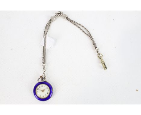 A vintage white metal and blue enamel fob watch. On a white metal Albertina chain