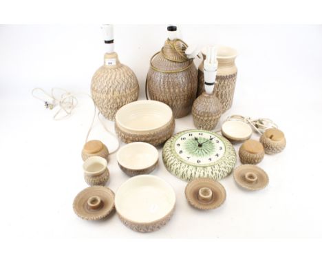 A collection of studio pottery. Including three lamp bases, a clock, candlesticks, etc, some marked 'Chillington Bristow S. D