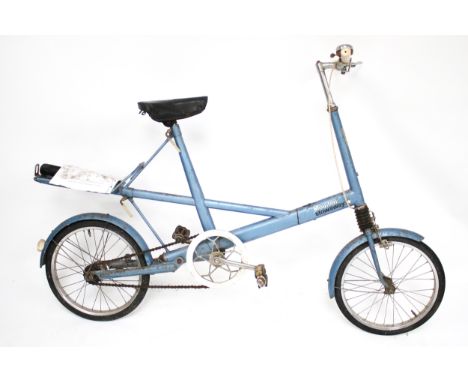A vintage Moulton Stowaway bike. With instructions and tools 