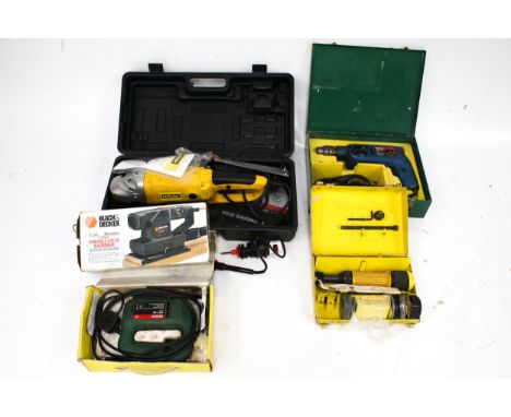 A group of assorted power tools. Including Bosch drill and jigsaw, Black & Decker sander, etc.