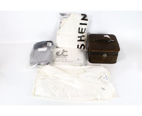 An assortment of vintage gents dress shirts and collars. Some of the collars conatined within a leather box with a handle to 