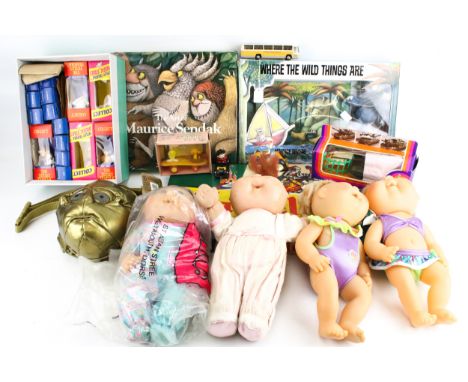 An assortment of vintage games and toys. Including a boxed Camelot set, C3P0 etc.