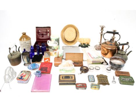 An assortment of Victorian and later collectables. Including a jelly mould modelled as a rabbit, a silverplated candlestick, 