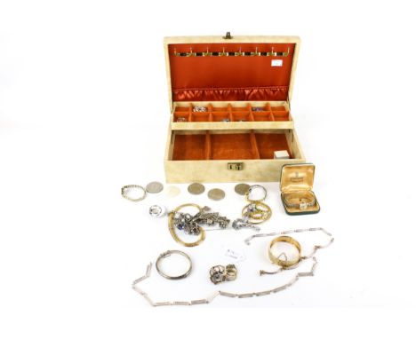 A collection of silver and costume jewellery to include six silver-gilt and stone set rings. In various designs; a silver ope