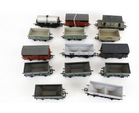 Fourteen OO gauge model railway wagons. Mostly Hornby examples, including tankers, box cars and bulkers, etc.
