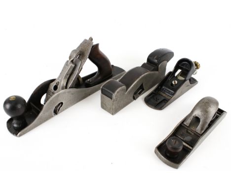 Four vintage steel planes, including two stamped 'Stanley'. Max L33cm