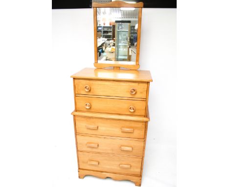 A Vilas mid-century chest of drawers with a mirror. Consisting of five long drawers with two different types of handles. L79c