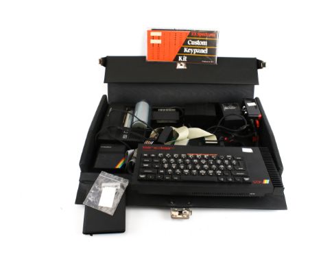 A vintage ZX Spectrum+ 128K Personal Computer from the 1980s. In a carry case with an Alphacom printer 32, ZX microdrive, etc