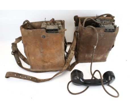 Two vintage US Army Signal Corps field telephone EE-8-A. In leather cases, H25cm