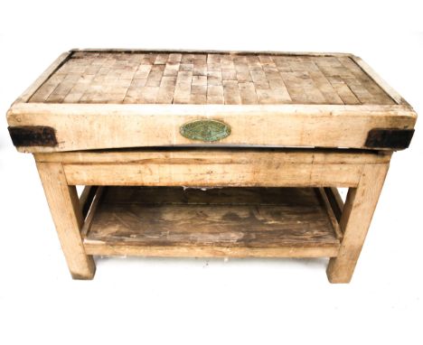 A vintage elm butchers block on base. With an undertier, H77cm x W122cm x D63cm