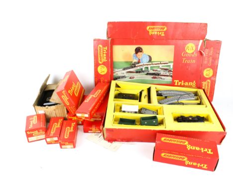 An assortment of OO gauge Tri-ang locomotives, wagons and track. Including a R3X electric goods train set, 12-R.190 Straight 