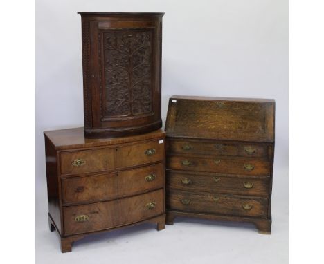 A VICTORIAN MAHOGANY BOW FRONT CHEST OF THREE LONG DRAWER with bracket feet 88cm wide; together with a oak bow fronted corner