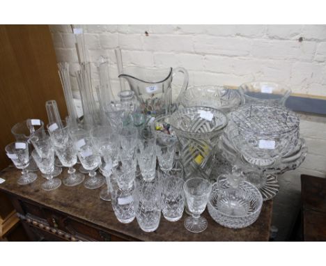 A LARGE COLLECTION OF VARIOUS GLASSWARE to include vases, wine glasses, jugs etc