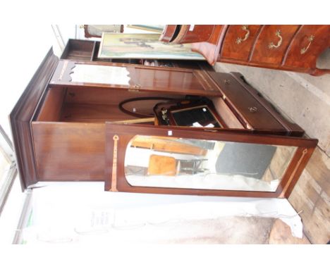 AN EARLY 20TH CENTURY MAHOGANY ART NOUVEAU STYLE WARDROBE with copper mounts, a glazed and a mirrored door above a single dra