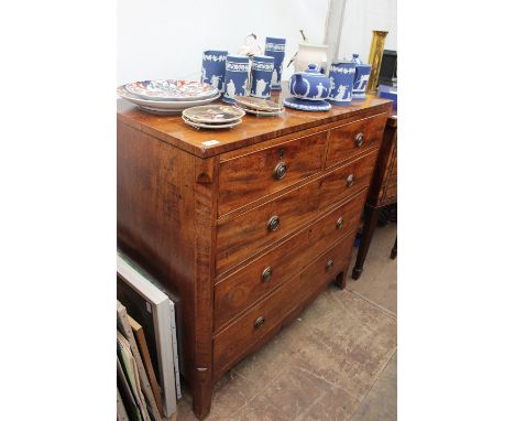 AN EARLY VICTORIAN CHEST OF TWO SHORT AND THREE LONG DRAWERS with brass ring handles and splayed bracket feet, 105cm wide x 5