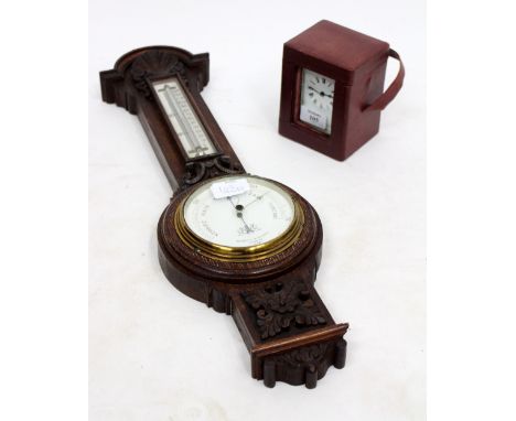 A SILVER PLATED CARRIAGE TIMEPIECE in a leatherette case, 8cm wide x 11cm high; together with a Negretti and Zambra barometer