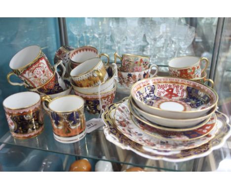 A COLLECTION OF 19TH CENTURY CROWN DERBY and other Imari pattern cups and saucers