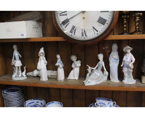 A GROUP OF SEVEN LLADRO PORCELAIN FIGURINES together with a Nao figurine, some AF