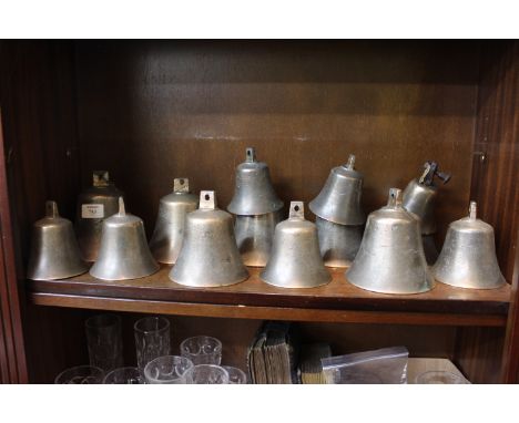A GROUP OF ANTIQUE SERVANTS BELLS of various sizes, many signed R Wells