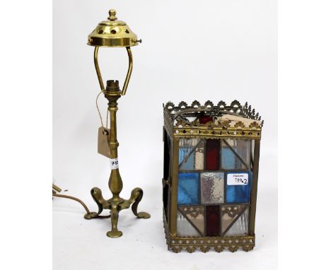 AN ANTIQUE STAINED GLASS LEADED PANEL LANTERN and a nouveau ships table lamp, the tallest measuring 41cm (2)