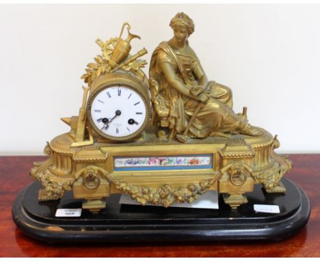 A 19TH CENTURY FRENCH GILT METAL MANTLE CLOCK the white enamelled dial signed 'Hry Marc Paris', overall 40cm wide