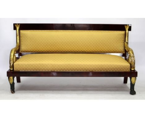 A CONTINENTAL MAHOGANY PARCEL GILT AND PAINTED SOFA with overstuffed upholstered back and seat, gilt scrolling arms in the fo