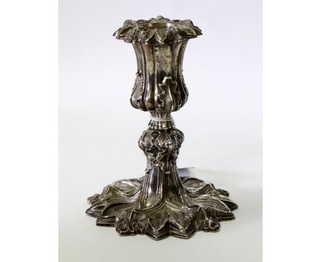 A VICTORIAN SILVER AESTHETIC MOVEMENT CANDLESTICK in the form of a flower on knopped stem with spreading base 13cm high 