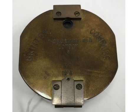 A modern brass colonometer compass, the brass outer case stamped "Brinton Compass", 8.5 cm wide x 4.5 cm high