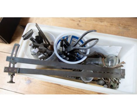 Various watchmakers tools including pliers, mini hammers, brass gages, punch etc.