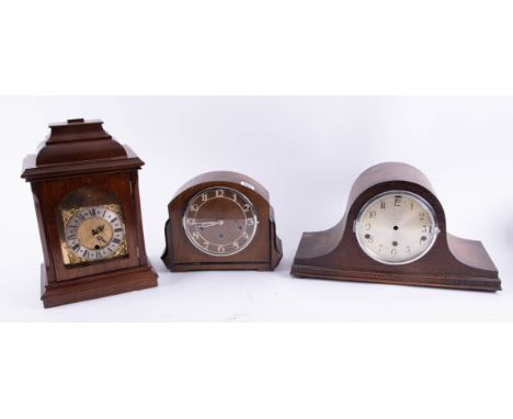 A 20th century mahogany bracket clock (partly built) together with four other assorted mantle clocks, an oak cased wall clock