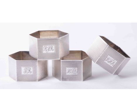 Matched set of 4 solid silver hexagonal shaped napkin rings with engine turned decoration hallmark Birmingham, maker FF, appr