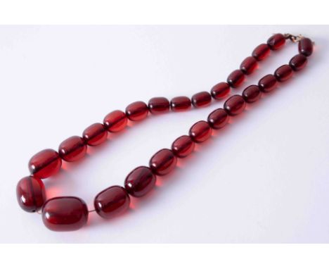 Antique single row ruby red amber necklace strung on wild silk with yellow gold bolt ring clasp, approx length 46cm, bead siz