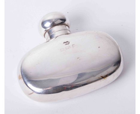 A small silver hip flask, height 7.50cm.