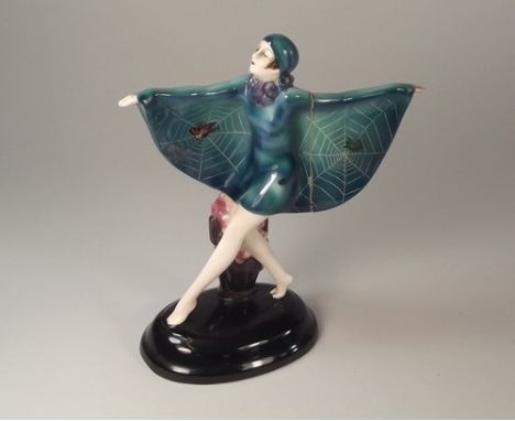 GOLDSCHEIDER.
An Austrian Goldscheider figure, the Butterfly Girl after Lorenzl. Height 20cm. CONDITION REPORTS: Left arm bro