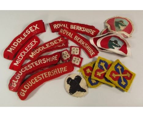 REGIMENTAL SHOULDER FLASHES ETC.
Various army regiment shoulder flashes & titles.
