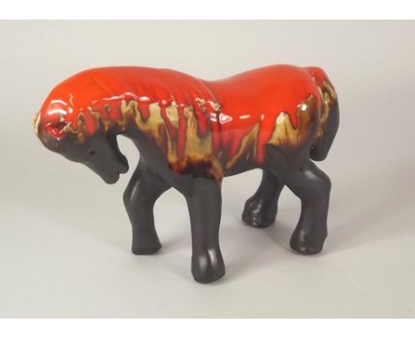 ERIC LEAPER.
A model of a heavy horse by Eric Leaper. Length 23cm. CONDITION REPORTS: The horse is in generally good conditio