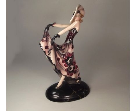 GOLDSCHEIDER.
An Austrian Goldscheider model of a lady in a hat, after Dakon. Height 34cm. CONDITION REPORTS: Base damaged & 