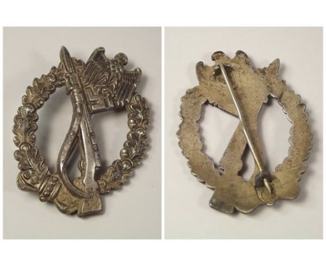 WWII GERMAN ARMY BADGE.
A WWI German Infantry Assault Badge. Maker's stamp 'FCL' ? to reverse.