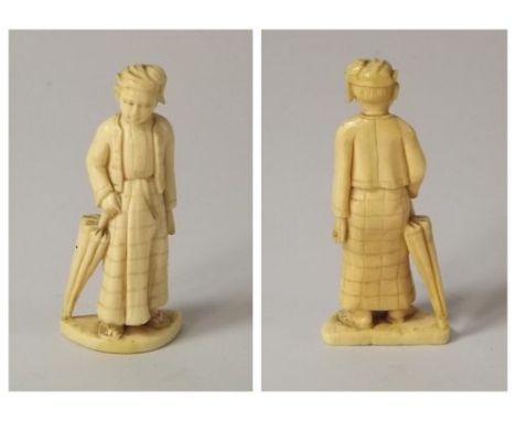 INDIAN FIGURE.
An Indian ivory small figure of a gentleman. 8cm. CONDITION REPORTS: There is an age crack running down the ba