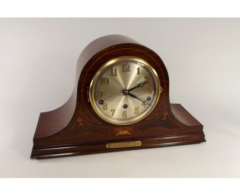 MANTEL CLOCK.
An inlaid mahogany 1930s presentation mantel clock. Width 42cm. 
