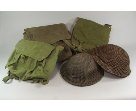WWII HELMETS & BACKPACKS
Two WWII British army helmets & three backpacks.
