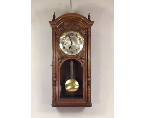 WALL CLOCK.
An early 20th century walnut cased, striking wall clock. Height 78cm. CONDITION REPORTS: Unfortunately we are una