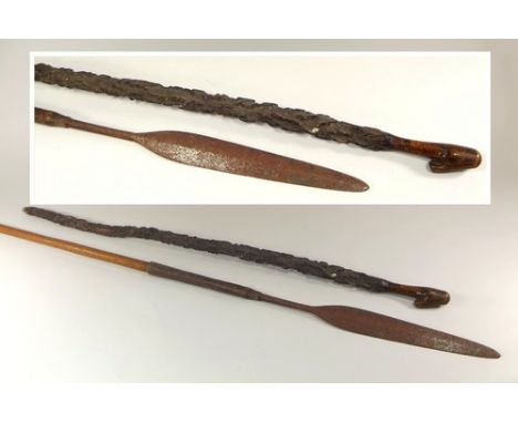 WALKING STICK & SPEAR.
An Assegai spear, length 125cm & a rustic walking stick. CONDITION REPORTS: The rustic stick is 83cm i